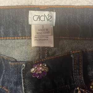 pretty jeans with beaded embellishments.  Washed a few times. Great condition.
